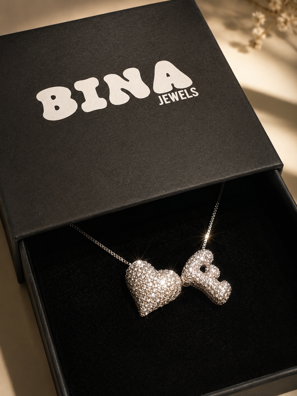 Love Letter Necklace with personalised initial and heart pendant in Bina Jewels gift box